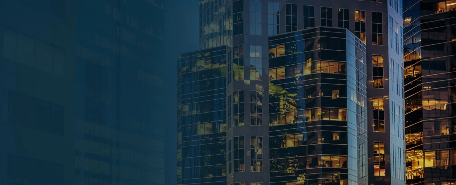 Modern architecture with warm windows at dusk