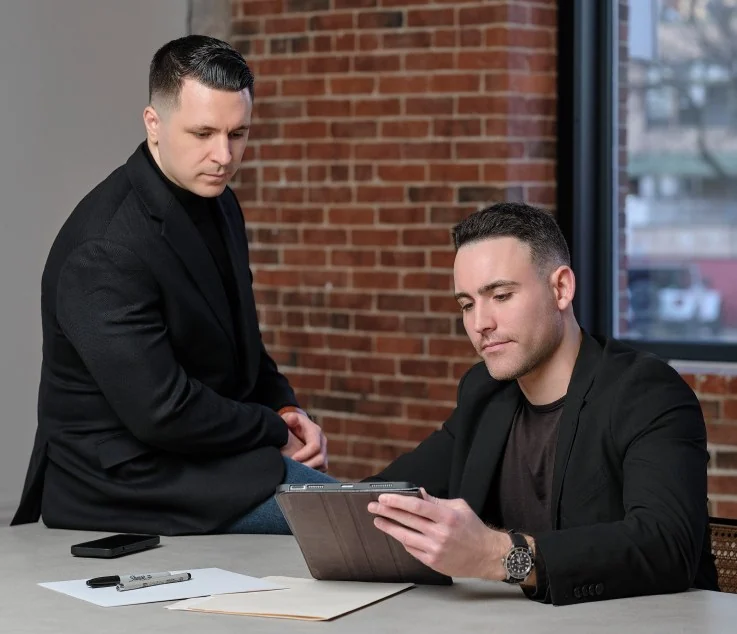 TaxBooks partners Blaise Aliberti and Ryan Kelly working together